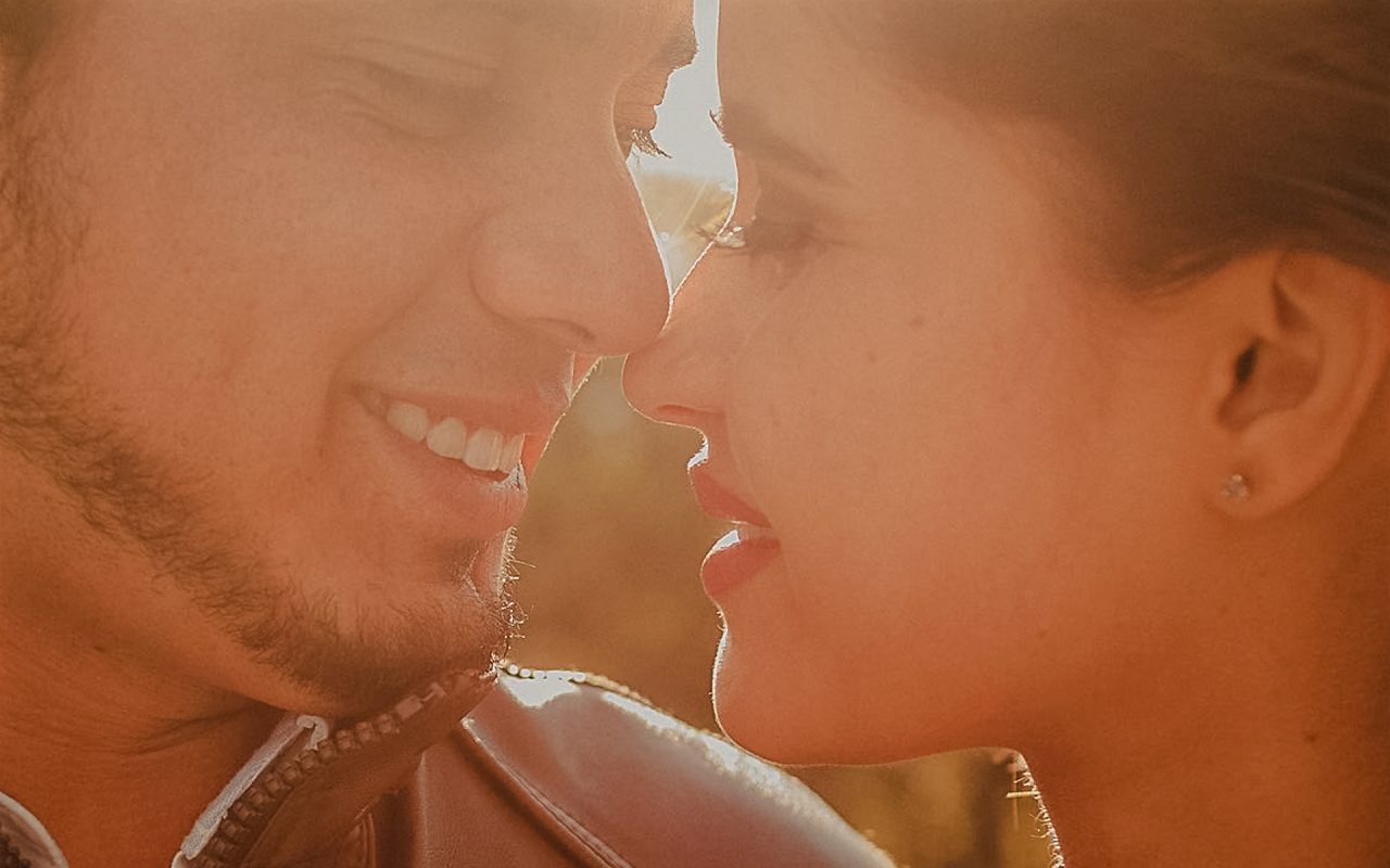 Emotional couple embracing during golden hour in Mexico, destination wedding photography