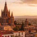 San Miguel de Allende skyline at sunset with Parroquia church, destination wedding location in Mexico