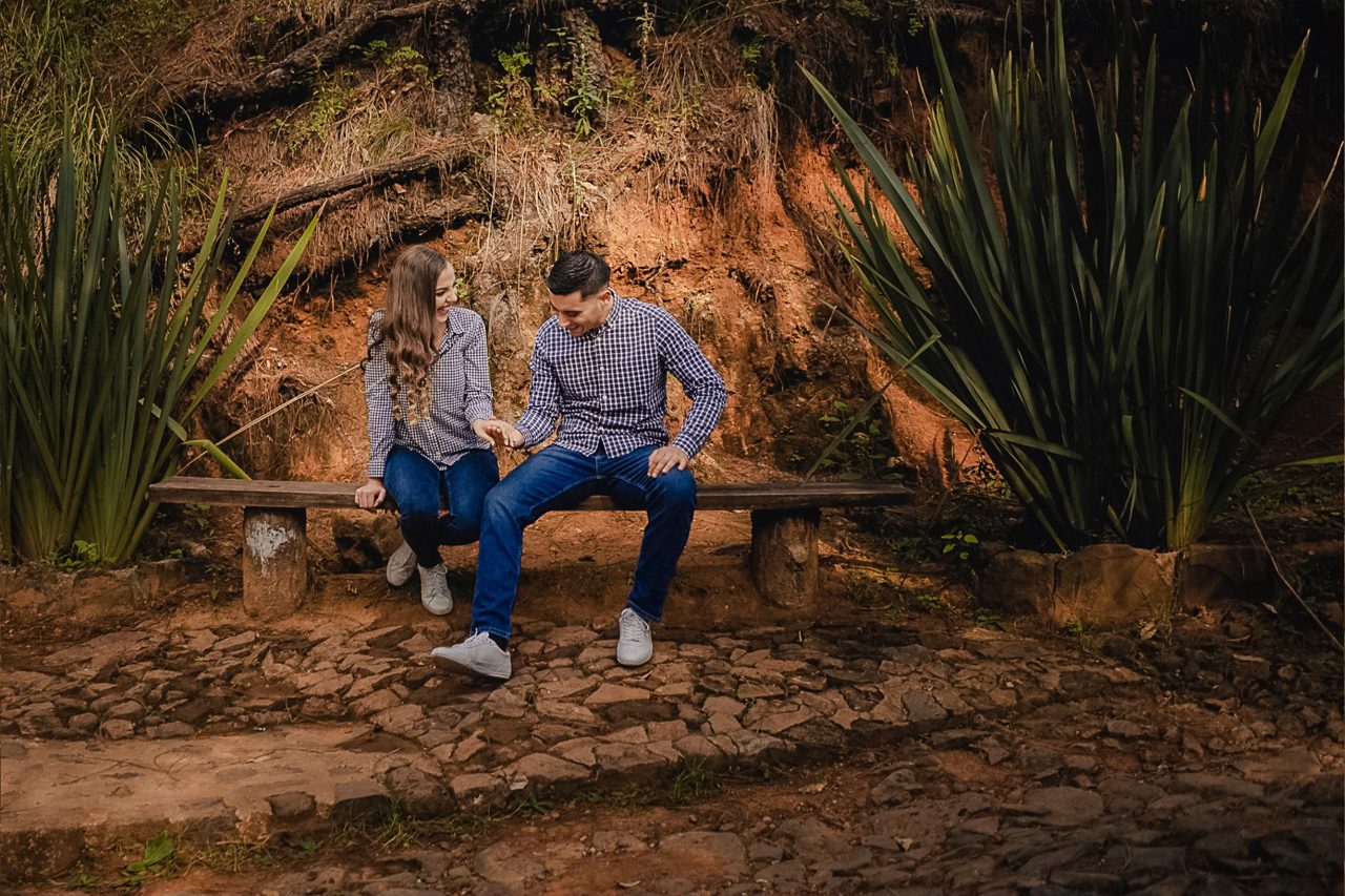 Romantic couple embracing in the forest in Mazamitla Mexico during a pre wedding session