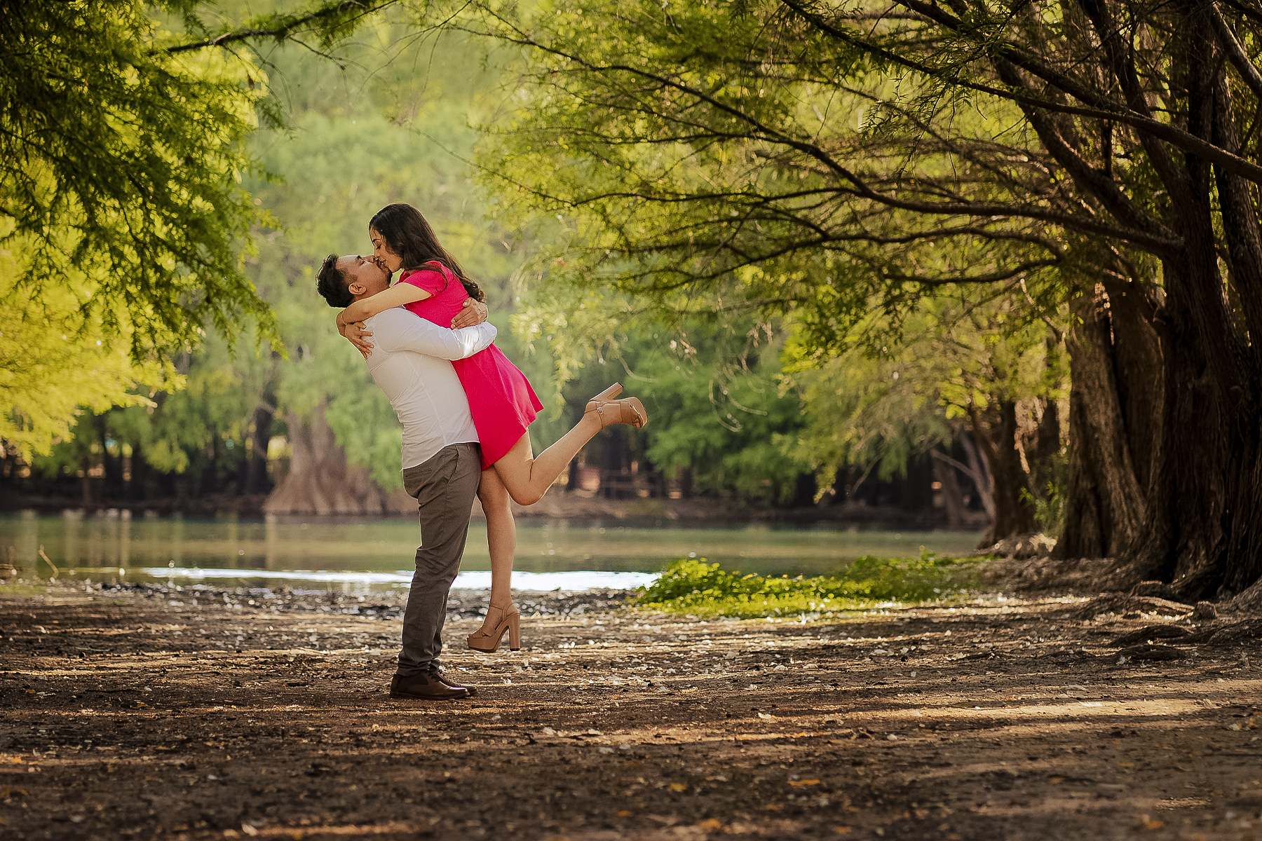 Romantic couple embracing at Lake Camecuaro in Michoacán during a destination wedding session